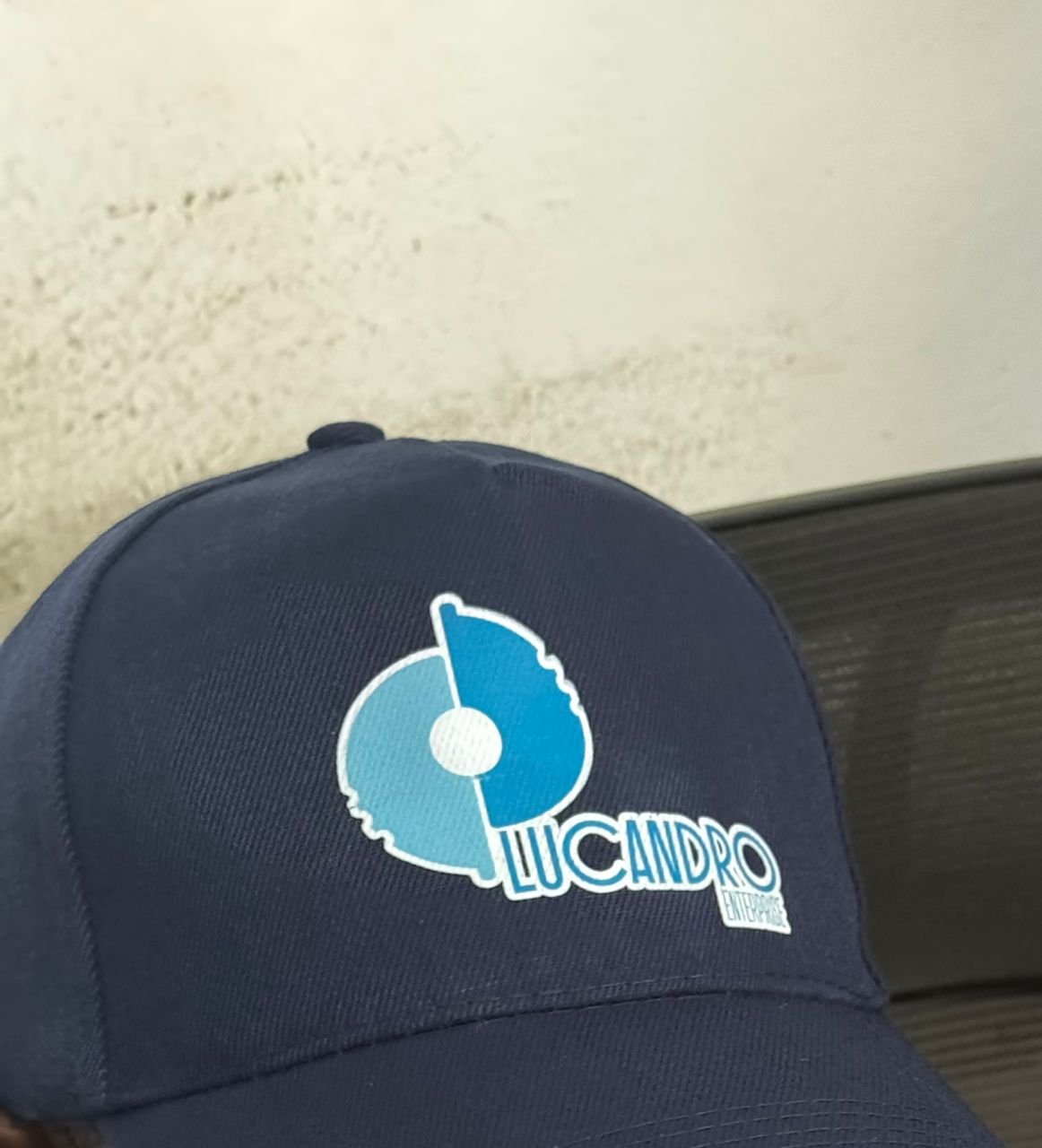 Close detail of Lucandro branded cap